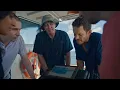 A video overview of the project, showing researchers and engineers conducting field work in the southern Great Barrier Reef.  The video shows the AI model detecting underwater imagery of crown-of-thorn-starfish, and footage of researchers analysing the imagery on a screen on the boat.