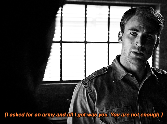 gif 6 of 9. a black and white gif. Steve is talking to Colonel Phillips who isn't visible to the audience. "i asked for an army and all i got was you. you are not enough", the Colonel says to him. brackets between the subtitles indicate those lines were said off-screen.