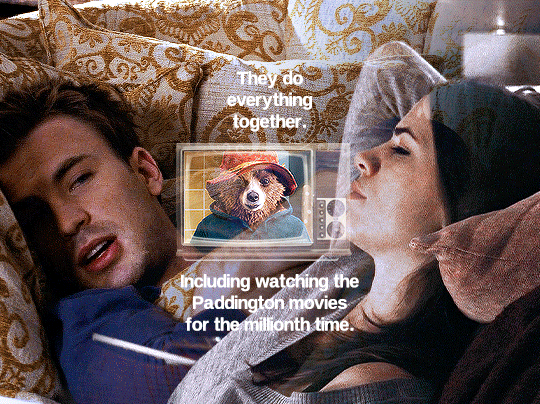 gif 5 of 10. thanks to blending shots, the gif gives the impression Steve and Peggy are lying on the couch together. Steve says something and smiles. Peggy, who is looking at something in front of her, moves her head to look at him. she then lightly smiles. at the center of the gif, there's the image of an old TV. Paddington (2014) is playing and it's a moment in which Paddington smiles to himself. there's text on the gif and it says, "they do everything together. including watching the Paddington movies for the millionth time".