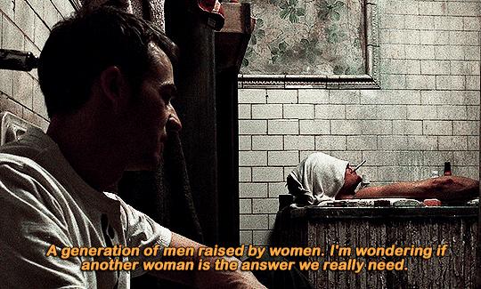 Gif #09 of 11. Tyler in is a bathtub and a cloth is covering his eyes. He has a cigarette in his mouth. He says "A generation raised by women. I'm wondering if another woman is the answer we really need". Jack is sitting on the floor, listening to him.