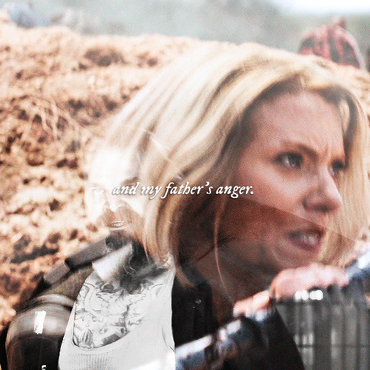 gif 2 of 3. two shots are blended together. one of Natasha fightning and another of Alexei looking angry. the text says, "and my father's anger".