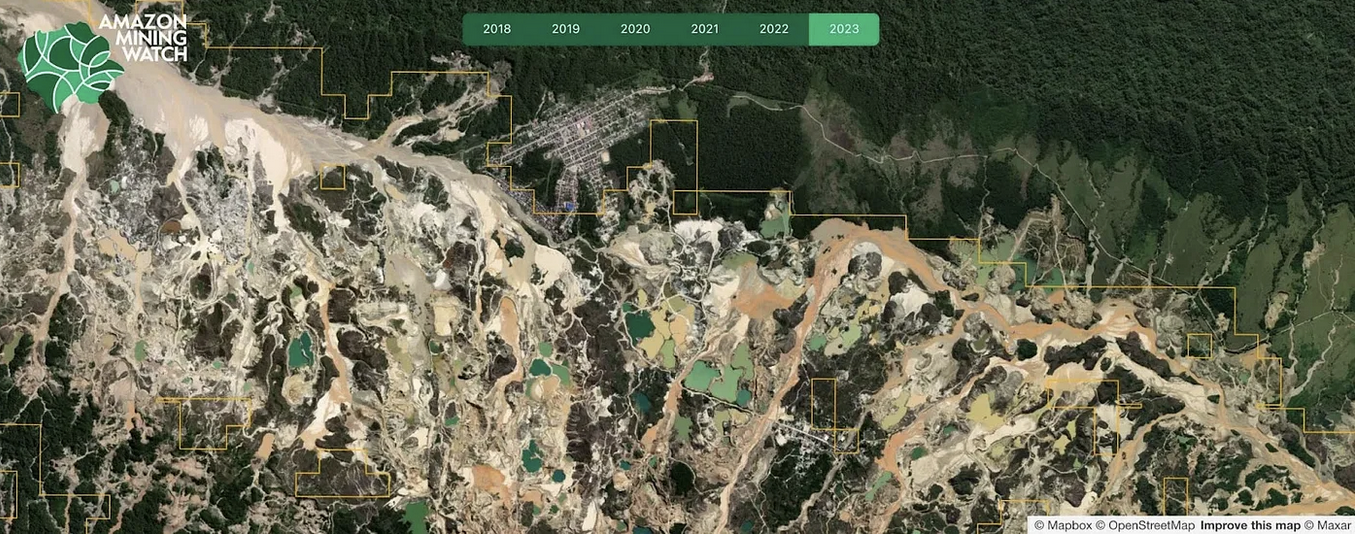 The massive Rio Huaypetue mine in Madre de Dios, Peru, as delineated by automated detection in Amazon Mining Watch. The town of Huaypetue, 2017 population 6,317, sits top center. Remaining intact forest appears at upper right.