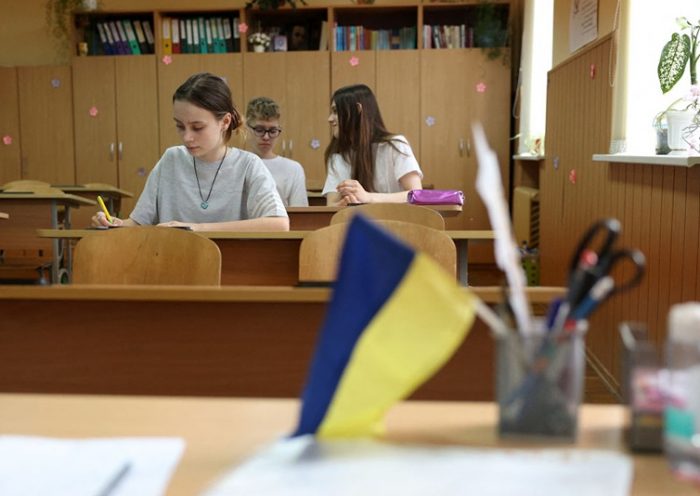 Eighth grade pupils of the 61st secondary school study in their classroom in Kyiv, on May 24, 2024, amid the Rusian invasion in Ukraine. While the Ukrainian education system has shown extraordinary resilience, resuming studies, mostly remotely, just three weeks after the start of the invasion, the upheaval of the war is undermining student performance. (Photo by Anatolii STEPANOV / AFP) (Photo by ANATOLII STEPANOV/AFP via Getty Images)