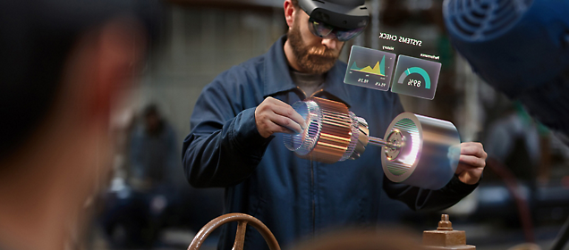 Un hombre usa una interfaz de realidad aumentada mientras trabaja en un componente mecánico.