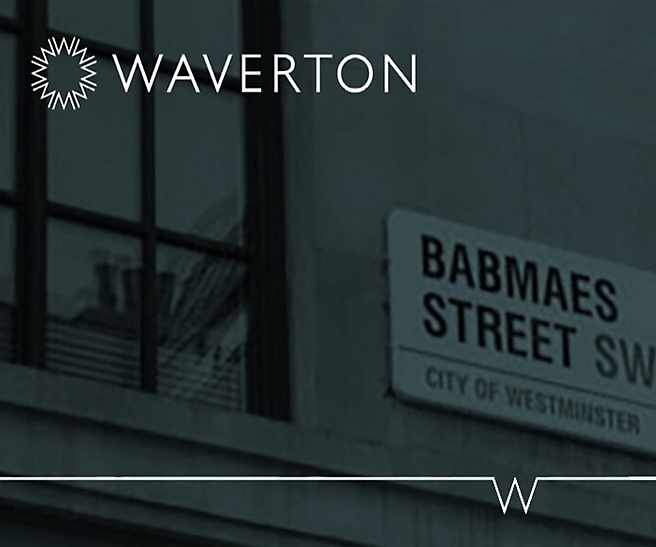 Symbol firmy Waverton umieszczony na budynku