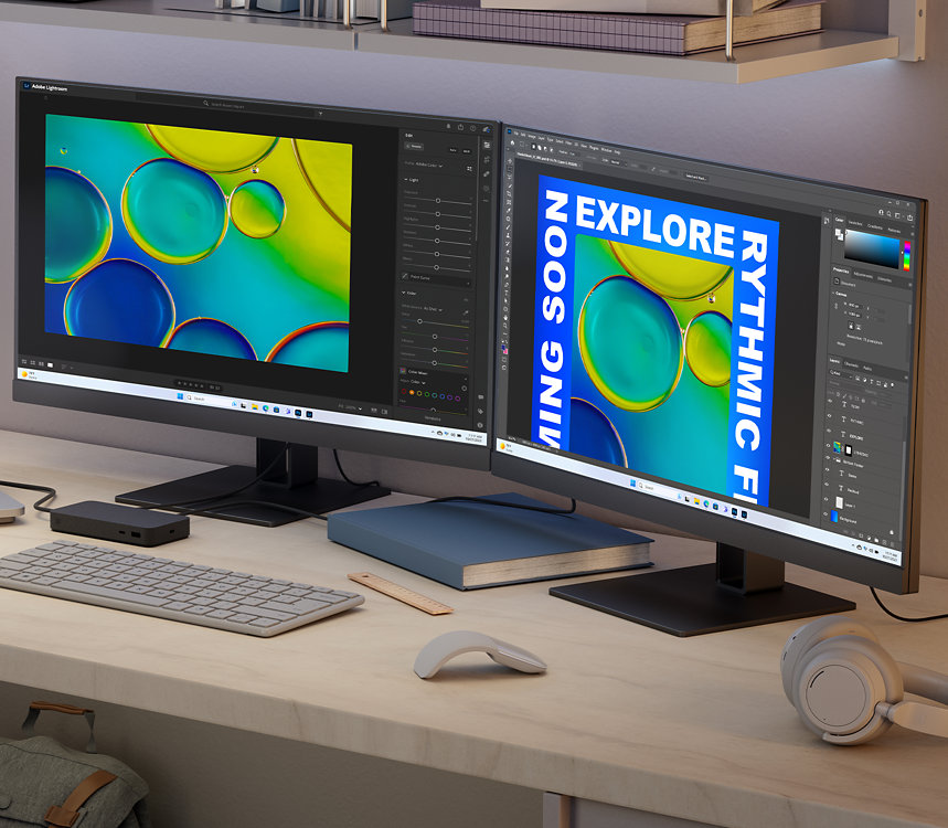 Sobre un escritorio, un dispositivo Surface Laptop Studio 2 para empresas está conectado a dos monitores adicionales y otros accesorios distintos, representando algunos de los accesorios a los que se puede conectar Surface Laptop Studio 2 para empresas. 
