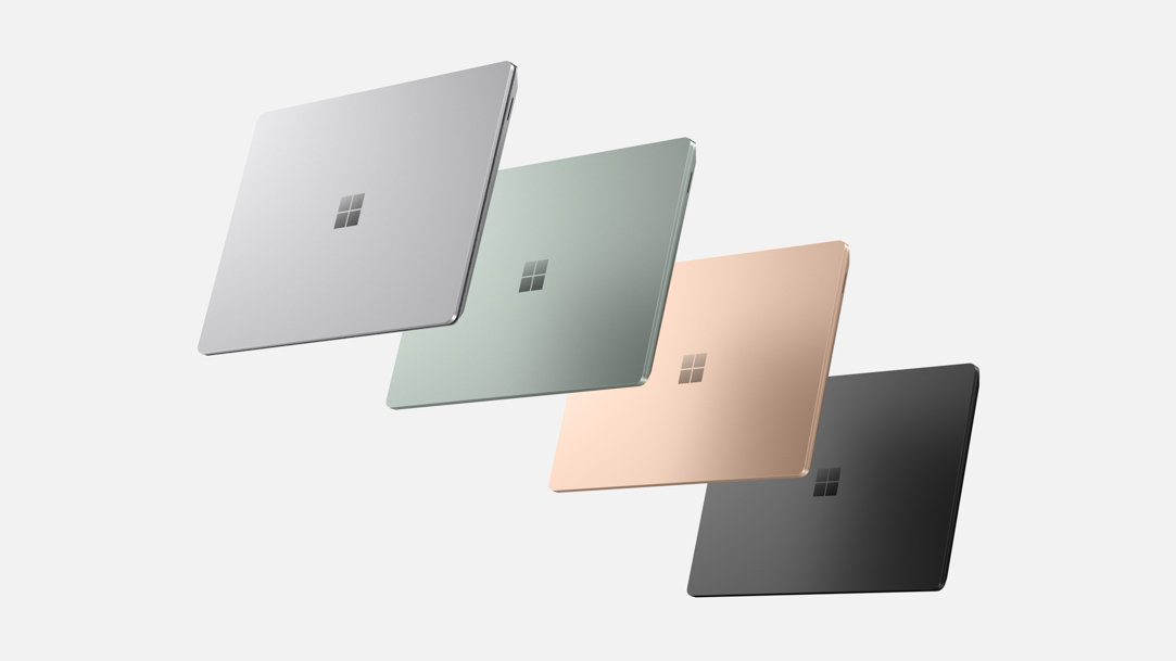 Surface Laptop 5 in silver, green, rose gold, and black