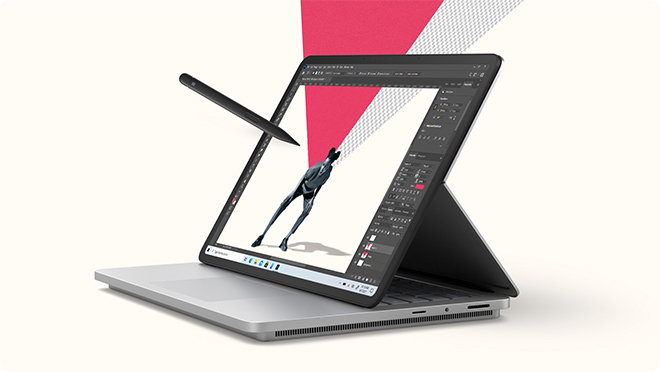 Surface Laptop Studio 2 z wyświetloną aplikacją Adobe Photoshop i unoszące się nad wyświetlaczem pióro Surface Slim Pen 2