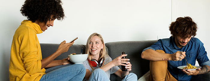 Group of people hanging out in a living room