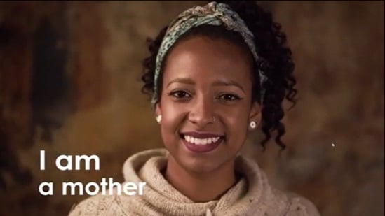 Image of a smiling woman overlaid with "I am a mother" Fair share for health and care video screen