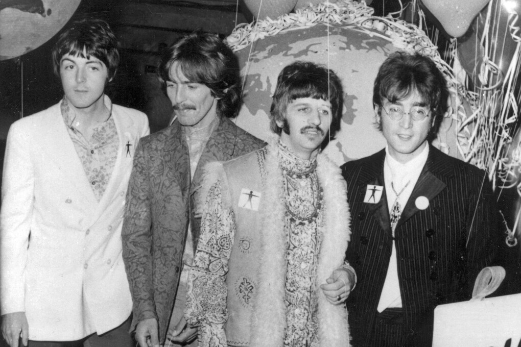 FILE - In this June 24, 1967 file photo, The Beatles, from left, Paul McCartney, George Harrison, Ringo Starr and John Lennon, appear at EMI Studios in London. Half a century after the Beatles’ psychedelic landmark, "Sgt. Pepper's Lonely Hearts Club Band" album, it stands as just one of many musical astonishments of 1967 that shaped what we listen to now.   (AP Photo, File)