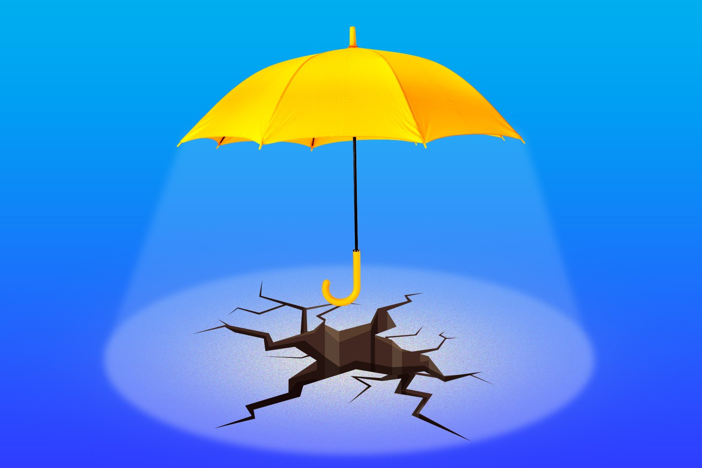 Photo illustration of an umbrella casting a spotlight over a large crack in the ground.