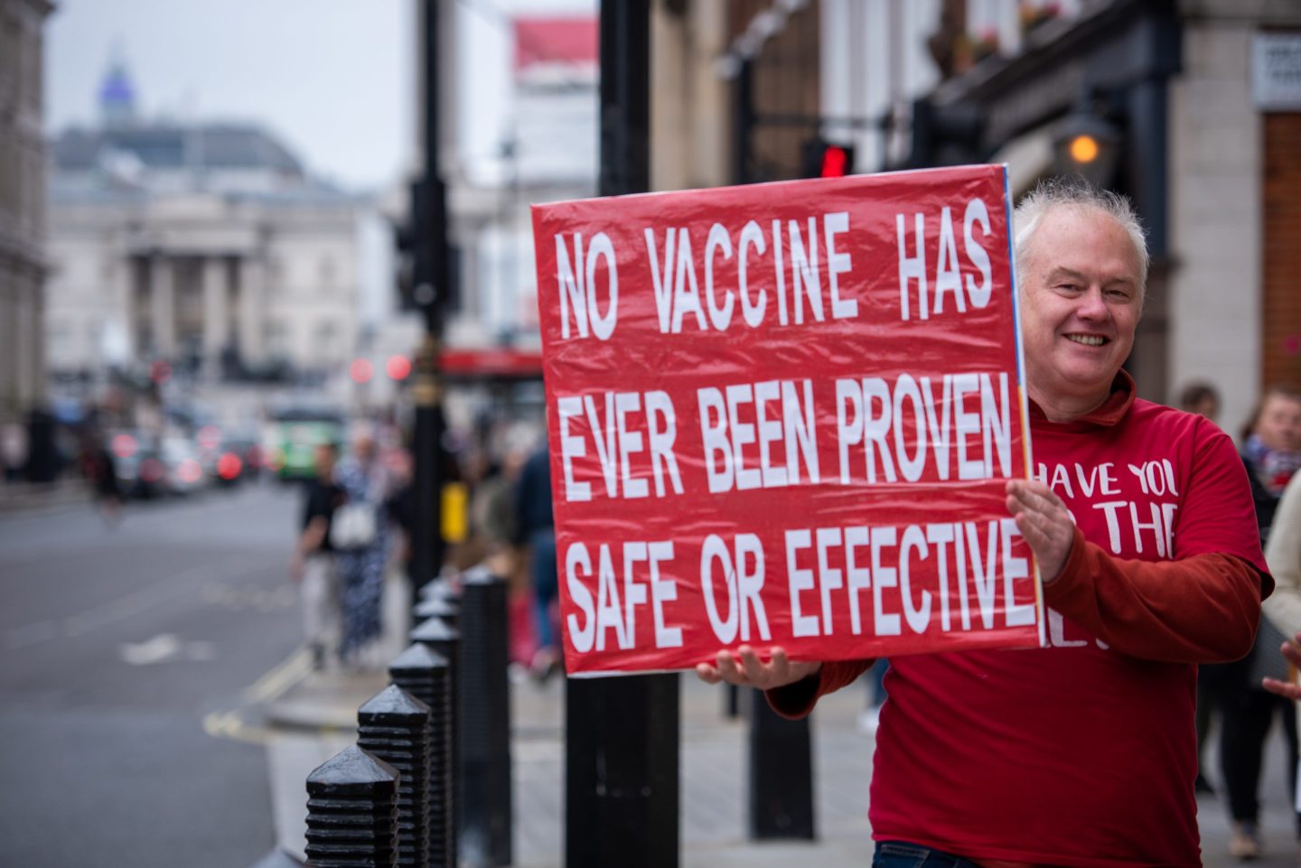 LONDON, UNITED KINGDOM &#8211; 2023/05/13: A protester holds a placard during the Truth Be Told Demo while marching to Parliament Square in London. In June 2023, the government plans to expand the age group of those eligible to get vaccinated with Covid-19 vaccines to 6-month-olds. Anti-covid vaccine demonstrators were protesting against this plan pointing to the possible risks posed by Covid vaccines. Some relatives of those who allegedly died from the Covid-19 vaccines also joined the protest to seek justice for their loved ones. Currently, the government only allows 5-year-olds and above to get the Covid-19 vaccine. (Photo by Loredana Sangiuliano/SOPA Images/LightRocket via Getty Images)