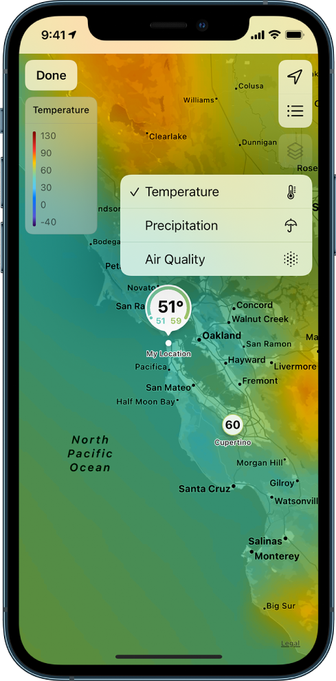 A temperature map of the surrounding area fills the screen. In the top-right corner, from top to bottom, are the Current Location, Favorite Locations, and Overlay Menu buttons. The Overlay button is selected and shows options for changing the screen display to show temperature, precipitation, or air quality. In the top-left corner is the Done button.