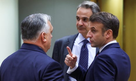 Viktor Orbán speaks to Emmanuel Macron as Greece's prime minister Kyriakos Mitsotakis looks on.