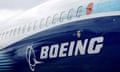 The Boeing logo is seen on the side of a Boeing 737 Max in 2022.