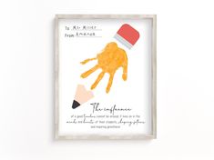 a framed poster with a hand and a pencil on it