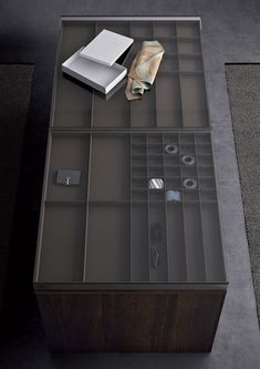 a glass table with some items on it