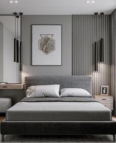 a modern bedroom with grey walls and white bedding, artwork on the wall above the bed