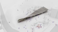 an aerial view of a building surrounded by trees and people walking around in the snow