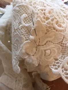 a close up of a piece of cloth with lace on it