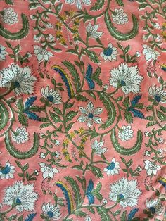 an old pink and green floral print fabric