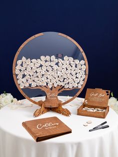 a table topped with a tree cut out of wood