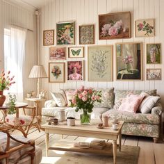 a living room filled with furniture and lots of pictures on the wall above it's coffee table