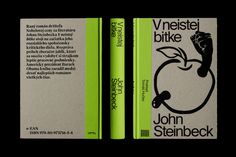 two books with green covers sitting side by side on a black background, one is open and the other has an apple