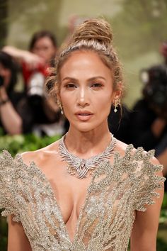 We can always count on Jennifer Lopez to do a red carpet right – and her look for this year’s Met Gala did not disappoint. As one of the co-hosts, Lopez understood the assignment (and more), wowing the crowds in a virtually see-through gown adorned with hundreds of thousands of bugle beads. Chanel, Vogue, Jennifer Lopez, Celebrities, Met, Gala, Beautiful Celebrities, Celebs, Met Gala