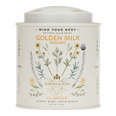 a jar of golden milk with flowers on it