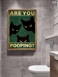 a bathroom with a toilet and a poster on the wall above it that says are you pooping?