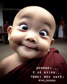 a little monk with big eyes smiling at the camera and saying, accorde i e ja avis so tomei meu cafe