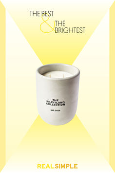 a white candle with the words real simple on it in front of a yellow background