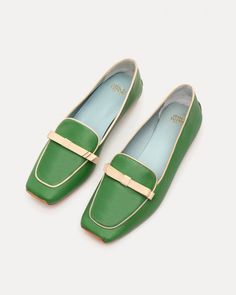 Every closet needs a loafer, and our Suzanne loafer is sure to be your new favorite. Made from soft calf leather, these timeless and comfortable slip-on loafers feature a contrast leather bow for an added feminine touch. Soft calf leather with contrast leather bow. Leather sole. Square stacked heel. Made in Brazil.