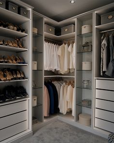 the closet is full of shoes and clothes