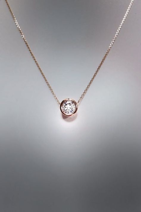 Black, solitaire and floating single diamond necklace designs, pendants and sets. Different cross, heart and initial diamond necklaces and designs. - http://www.ringtoperfection.com/diamond-necklace-designs/ Cartier, Diamond Solitaire Necklace, Solitaire Pendant, Single Diamond Necklace, Diamond Pendant Necklace, Diamond Pendant, Diamond Necklace, Diamond Necklace Designs, Ring