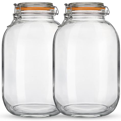PRICES MAY VARY. [PREMIUM GLASS & AIRTIGHT LIDS] - These airtight jars are made of food-grade glass, no smell, and 100% BPA-free. Clamp jars are sealed with a high-quality food-grade rubber gasket cover and a stainless steel locking clip design to ensure that your food is sealed and never gets bad, keeping fresh [HAVE IT ALL] - All food jars with lids have special safety packaging. These 128 FL OZ glass canning Jars are 10.6’’ tall, 6.7’’ at the bottom and 1 replaceable silicone gaskets are prov Food Storage, Mason Jars, Gallon Glass Jars, Glass Jars With Lids, 1 Gallon Glass Jar, Gallon Jars, Canning Jars, Canned Food Storage, Glass Storage Jars
