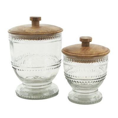 Style these accent jars on a shelf or countertop to store and showcase small trinkets, dried flowers, or decorative objects, adding a touch of organization and visual interest to your space. Designed with felt or rubber stoppers at the base that prevent scratching furniture and table tops, as well as sliding around. Please note that this item is for decorative purposes only and is not food safe. Glass decorative jars make a great gift for any occasion. Suitable for indoor use only. This item shi Design, Apartment Therapy, Kitchen Canister Sets, Kitchen Canisters, Canister Sets, Storage Canisters, Glass Canisters, Decorative Jars, Kitchenware