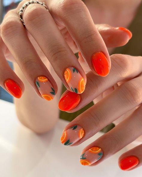 Embrace a colorful nail aesthetic this summer with these pretty orange nails! From trendy nail art to simple designs, discover the perfect ideas for your next manicure! For example, we love these short fruit nails. Holiday Nails, Manicures, Design, Blue Nail, Holiday Nail Designs, Summery Nails, Uñas, Fruit Nail Designs, Nails Inspiration