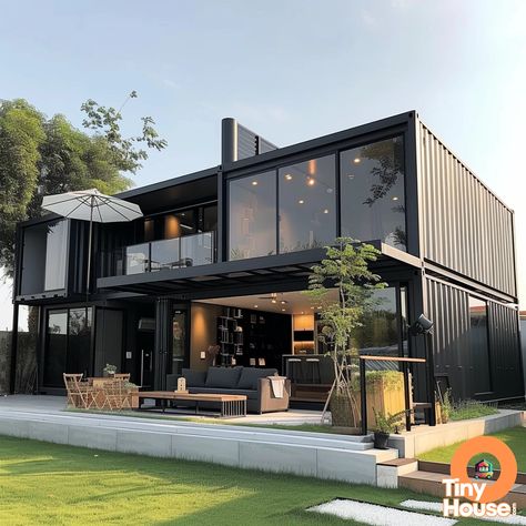 Check out this amazing shipping container house in a sleek and modern design! The combination of white, gray, black, and metallic colors creates a stunning visual appeal. Get inspired for your own container house project! Share with us what you're planning to build! #containerhouse #designinspiration #tinyhome