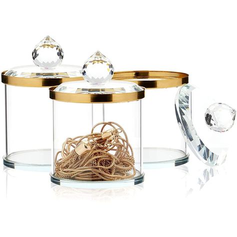 PRICES MAY VARY. Glass Storage Jars with Lids: Use this set of 3 bathroom jars for cotton balls and cotton swabs or to organize your jewelry, rubber bands, and small trinkets Endless Uses: Our clear crystal vanity jars will make the perfect gift for your friends and coworkers at an upcoming housewarming party or holiday gift exchange Reliable Quality: The bathroom jars are made with high-quality, easy to clean crystal glass with gold accents; use the glass jars as home decor to keep potpourri in Jewellery, Crystals, Jewelry, Crystal Jewelry, Trinket, Lidded, Jewelry Box, Crystal Box, Crystal Jewelry Box
