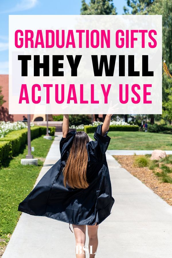 a woman in graduation gown holding up a sign that says graduation gifts they will actually use