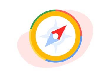 Kuva kompassista Googlen väreissä.