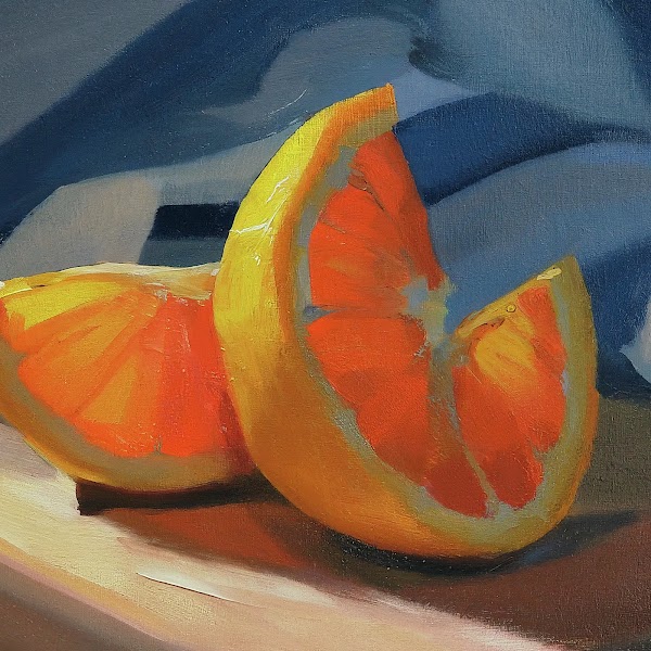 Painting of orange slices on a wooden board