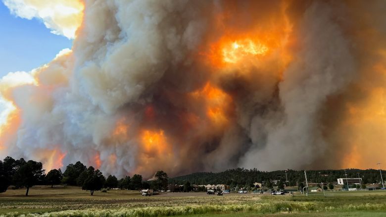 Smoke rises from a wildfire in Ruidoso, New Mexico, U.S., June 17, 2024, in this picture obtained from social media. Pamela L. Bonner/via REUTERS THIS IMAGE HAS BEEN SUPPLIED BY A THIRD PARTY. MANDATORY CREDIT. NO RESALES. NO ARCHIVES.