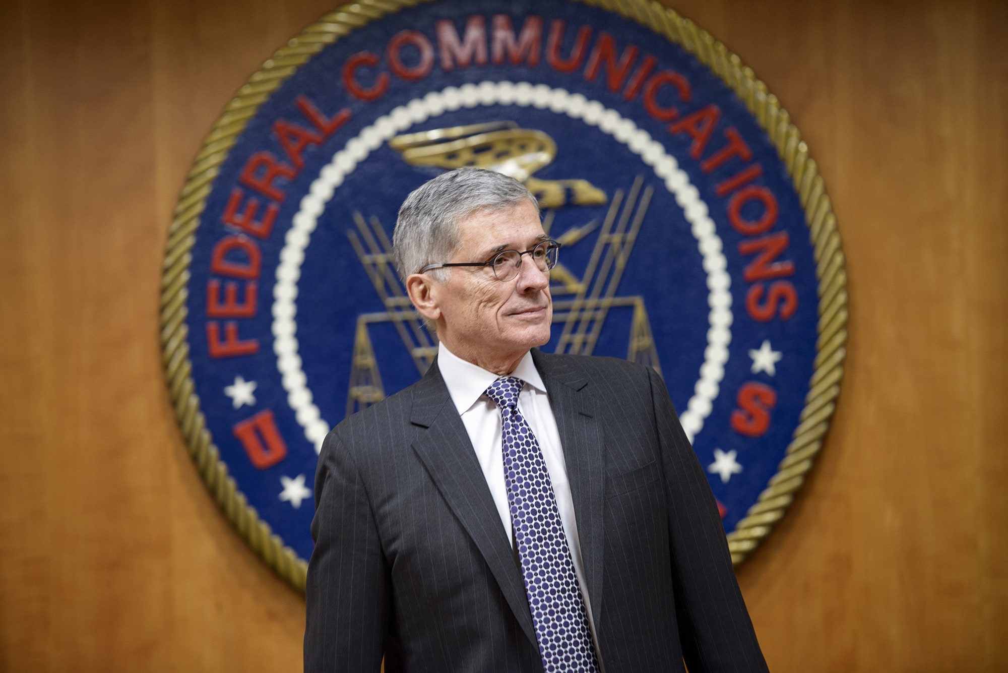 Federal Communication Commission Chairman Tom Wheeler waits for a hearing at the FCC December 11 2014 in Washington DC.