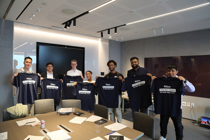 iMentor students and mentors spend the day at corporate sponsor EY's office for speed networking and business solutions workshops during iMentor's Bring Your Mentee to Work Day.