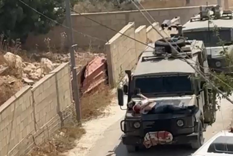 Israeli army straps injured Palestinian man to the front of a military vehicle and uses him as a human shield, Jenin, June 22, 2024. (Photo: Social Media)