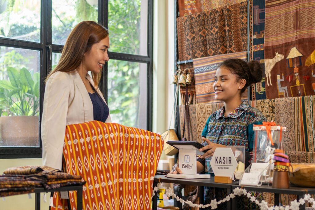 two women in a fabric store